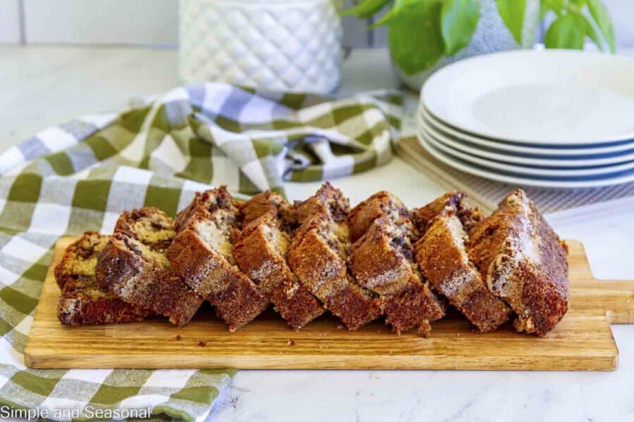 stack of slices of banana bread on a cutting board