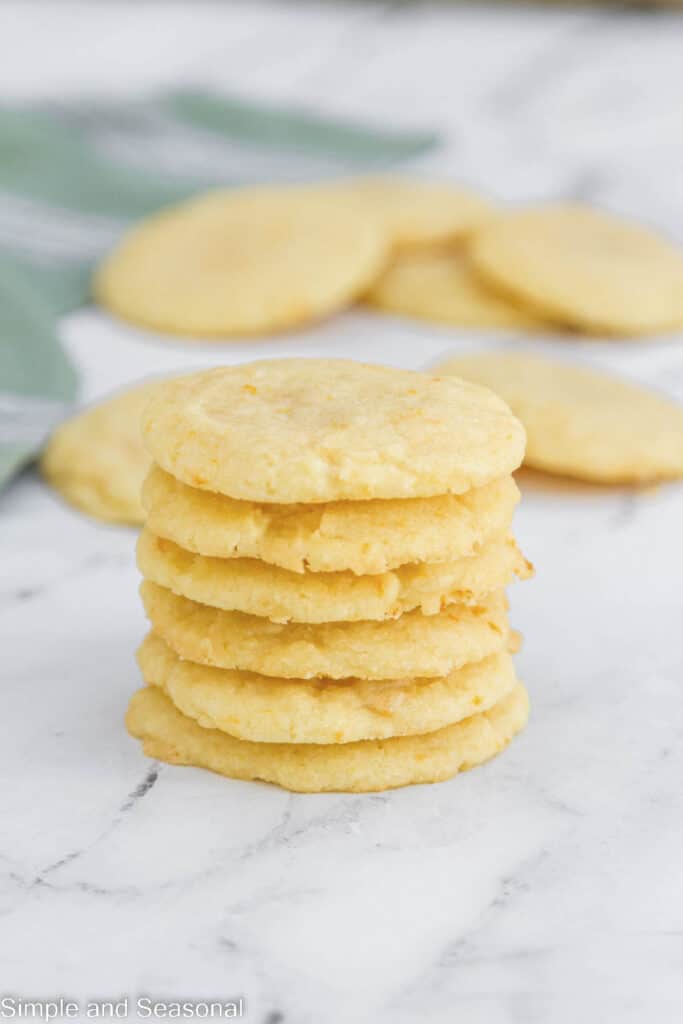 orange butter cookies with no chocolate stacked up