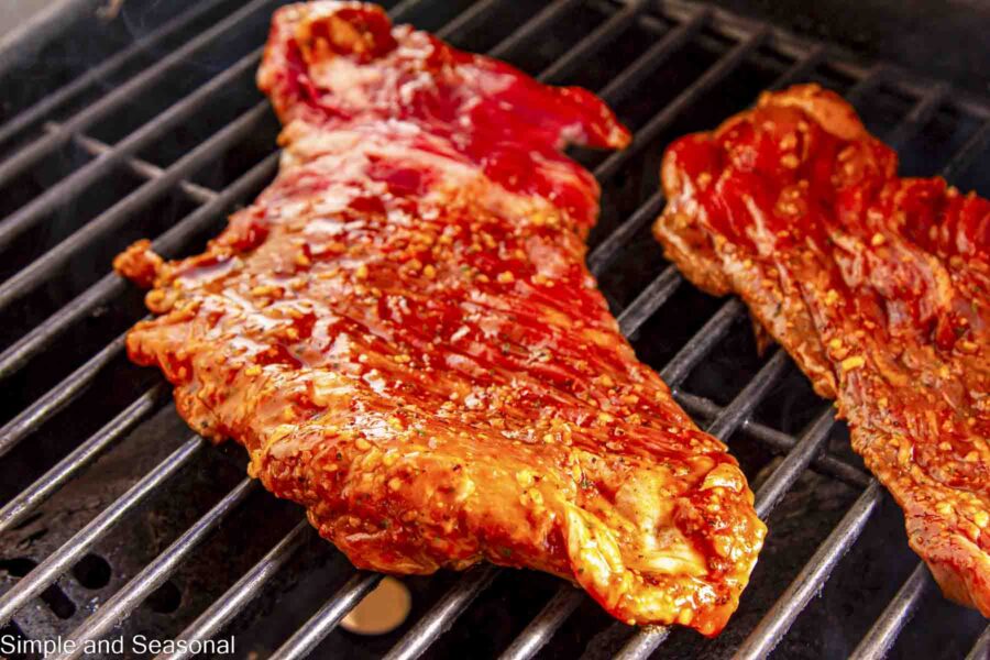 grill with marinated meat ready to cook