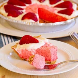 close up of slice of kool-aid pie with fork