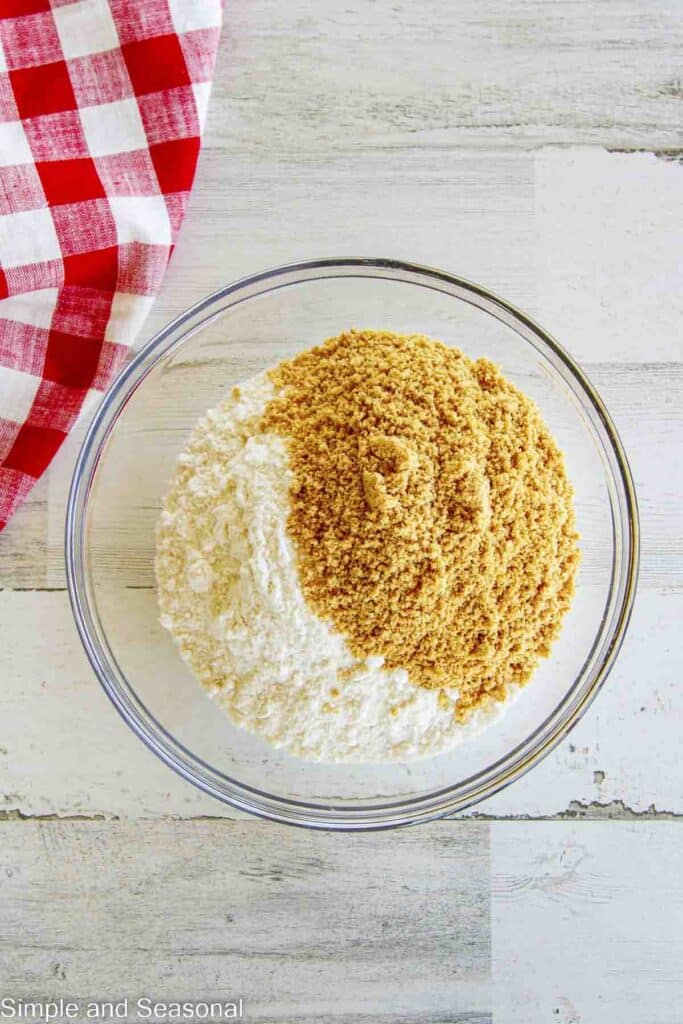 sugar cookie mix and graham cracker crumbs in a mixing bowl