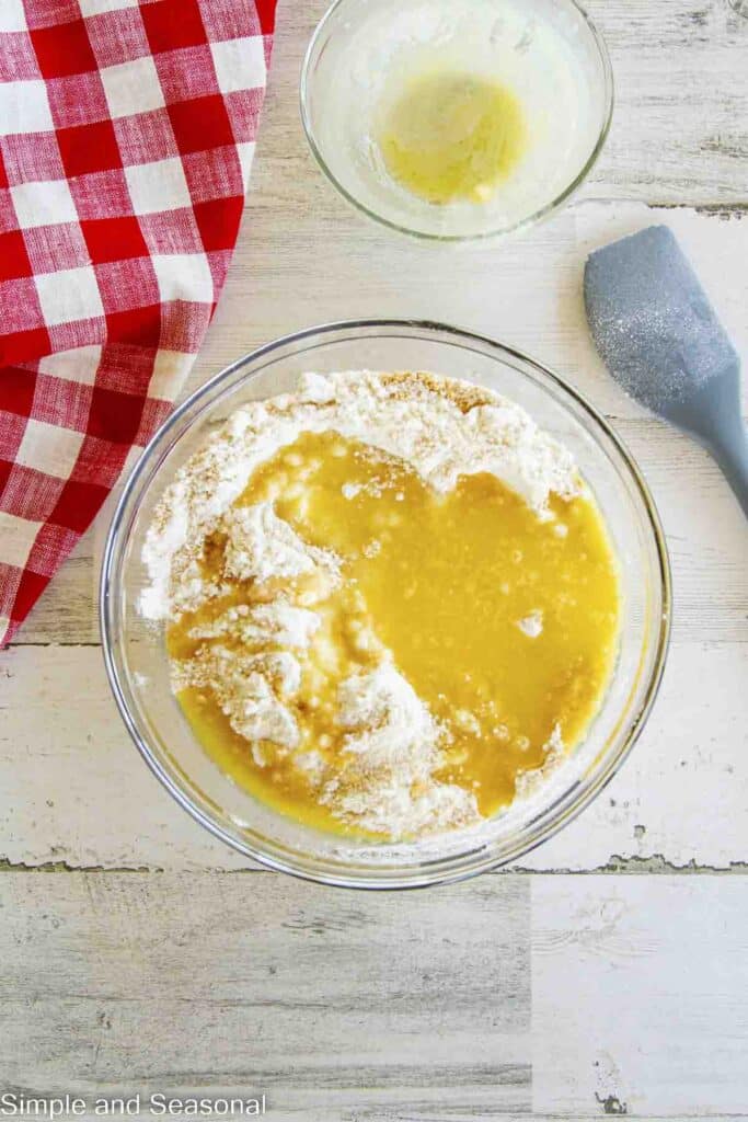 melted butter poured over dry mixture