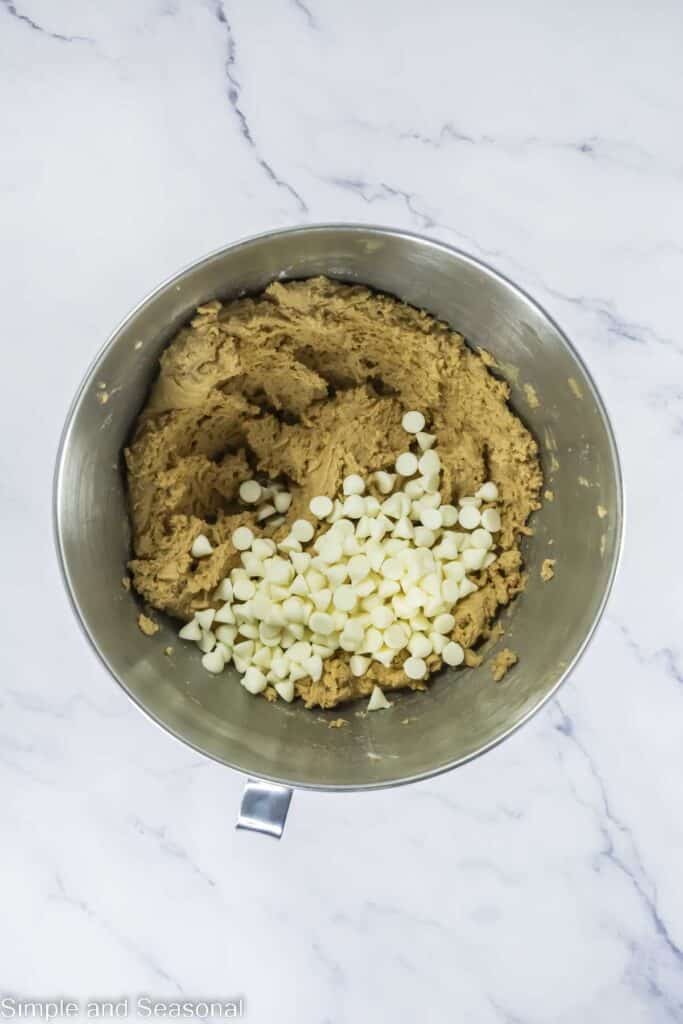 white chips ready to be folded into cookie dough