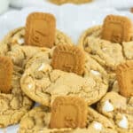 closeup of platter of cookies with white chips and Lotus biscoff cookie biscuits sticking out of the top of each cookie