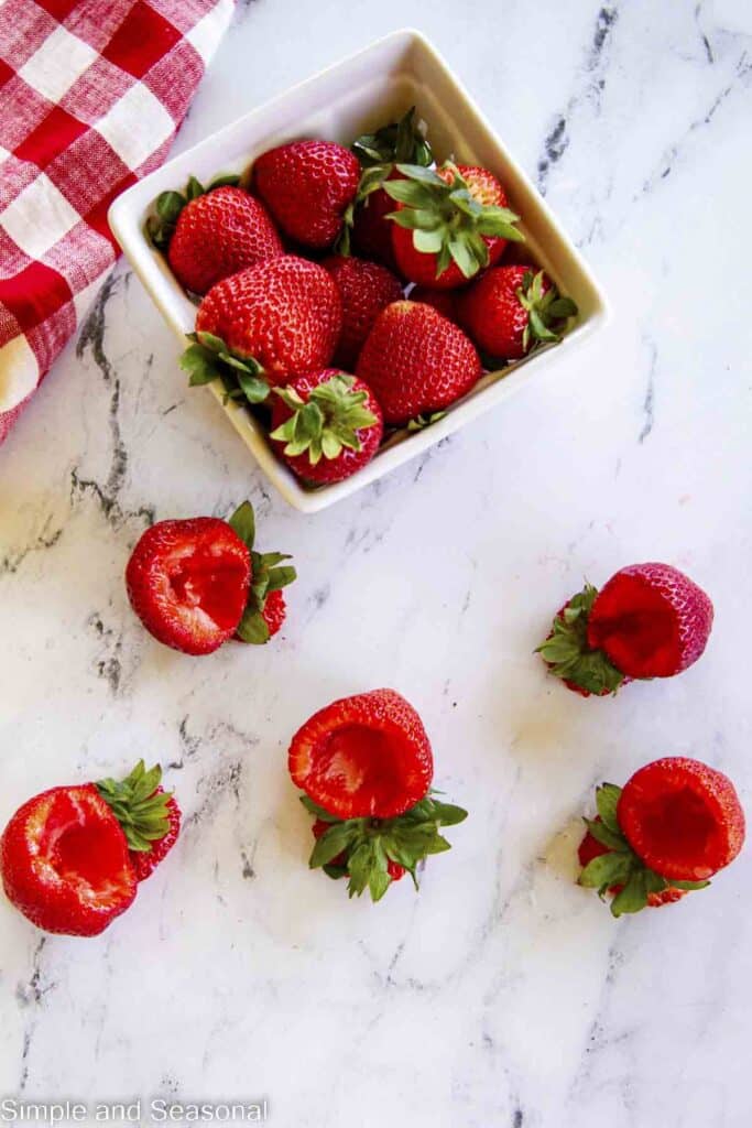 strawberries with the centers removed to make room for chocolate filling
