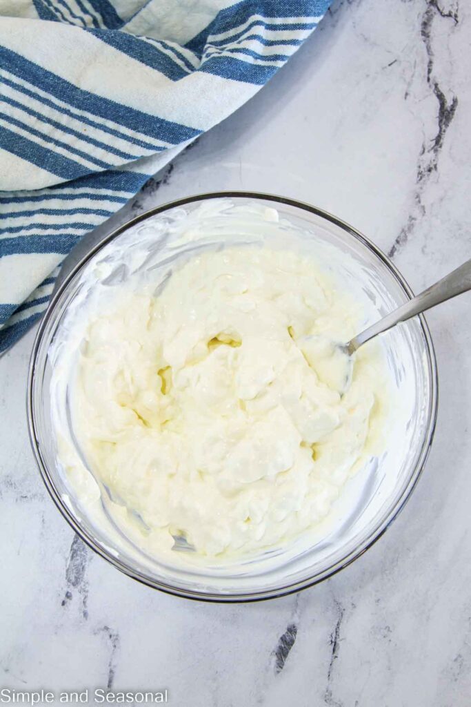 spoon in sour cream mixture