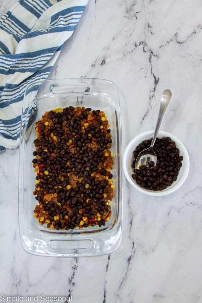 black beans layer on top of meat mixture