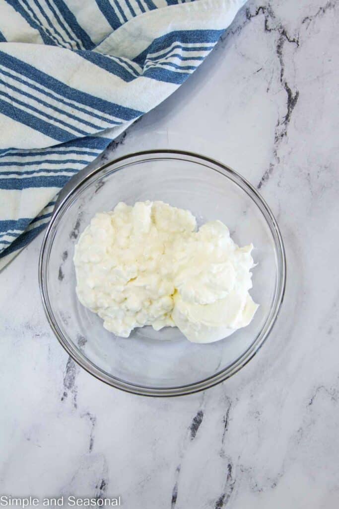 mixing bowl with sour cream and cottage cheese