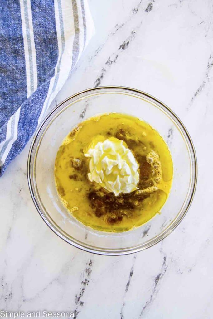 wet ingredients like eggs, sour cream, etc in a medium mixing bowl