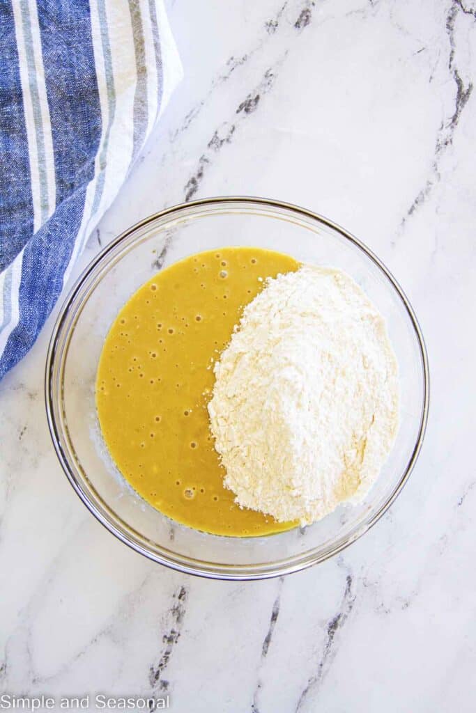 Adding dry ingredients to wet