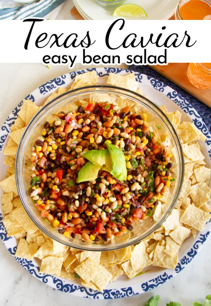 top down view of bowl of bean salad on platter with chips; label reads Texas Caviar easy bean salad