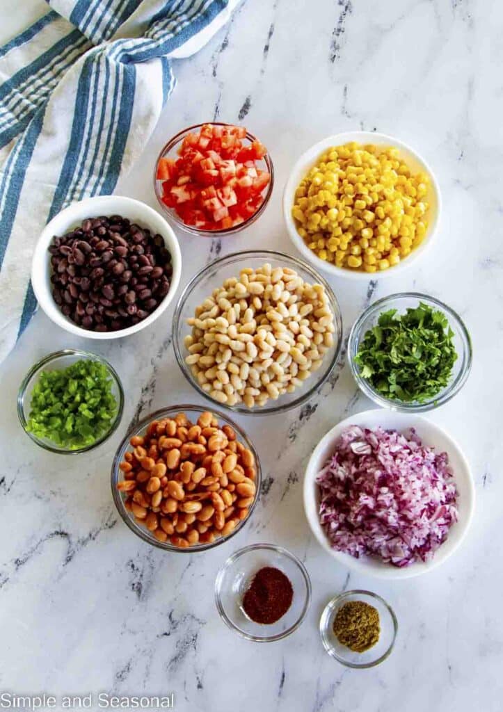 ingredients for Texas Caviar bean salad in laid out in small bowls (read list of ingredients below)